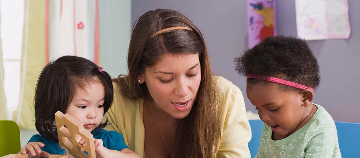 Teacher working with students