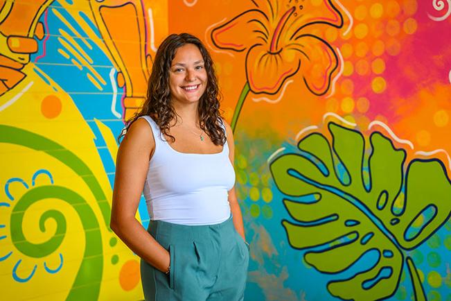 Jean Ellen with mural in background